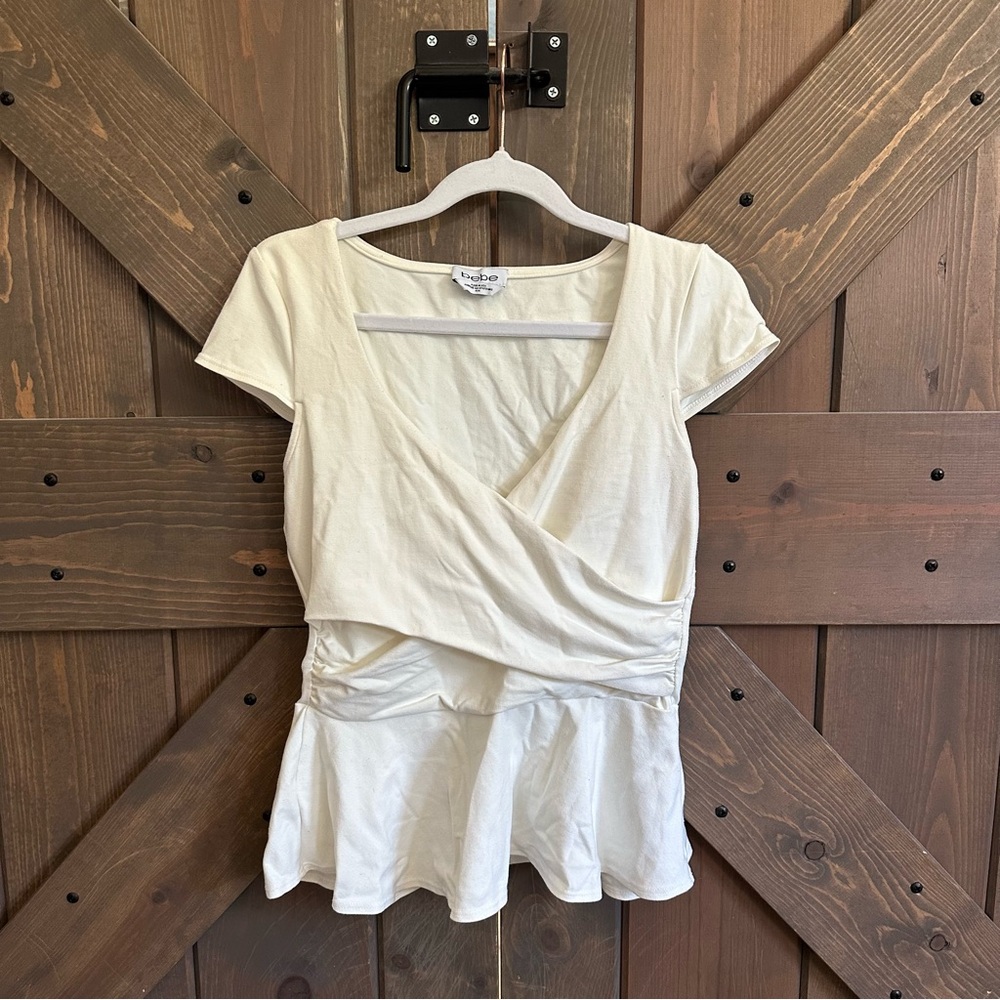 bebe ivory Peplum Wrap Blouse